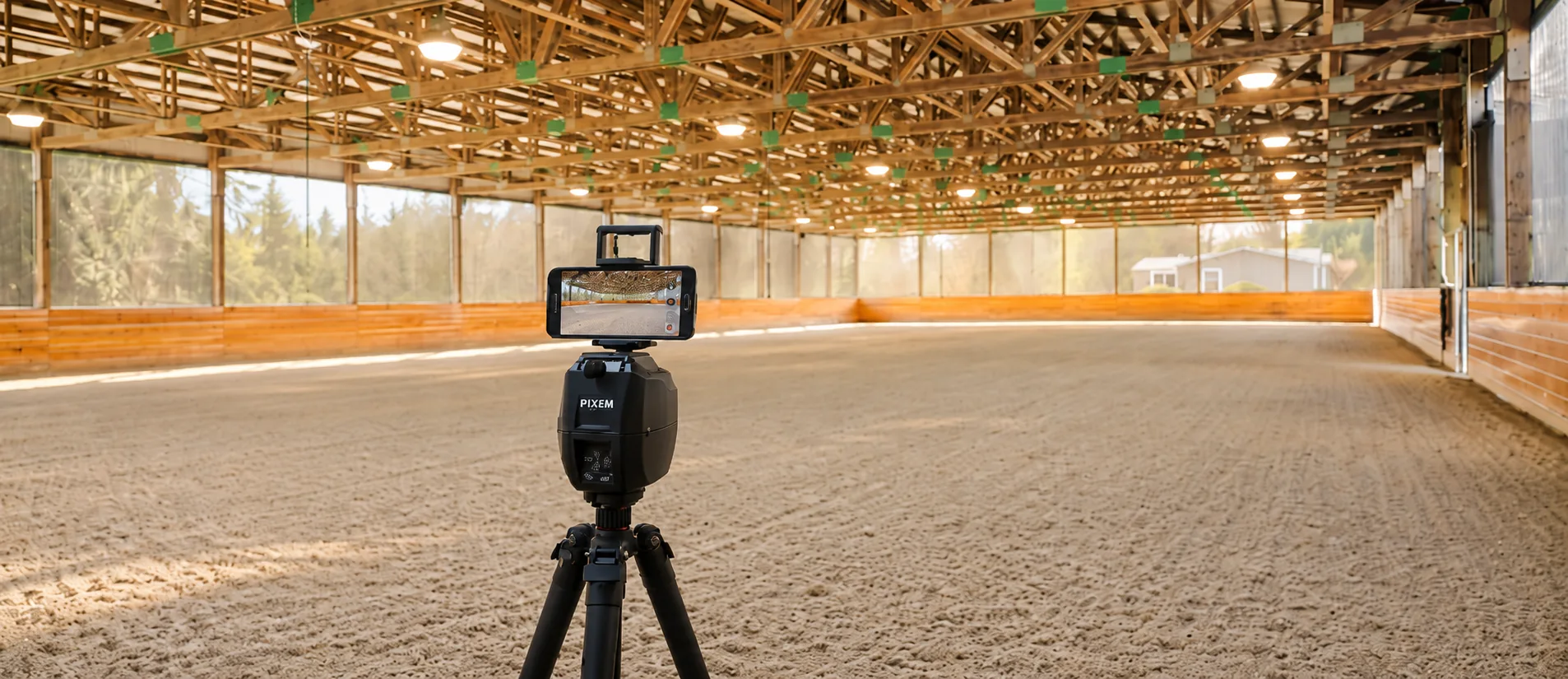 PIXEM tracking mount and phone set up for virtual riding lessons in the Seven Hills Training indoor arena in Monroe, Washington