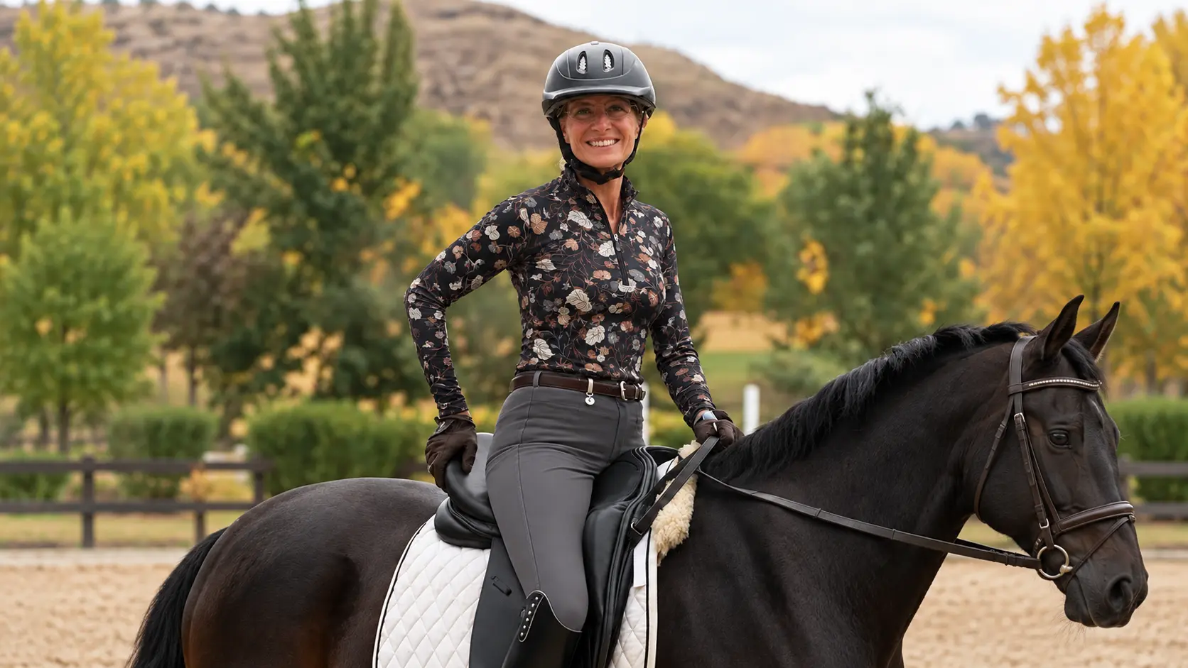 Adult amateur dressage rider mounted on a black horse